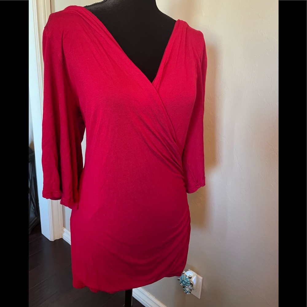 Dressy top with cute bell sleeves and splits in the shoulders